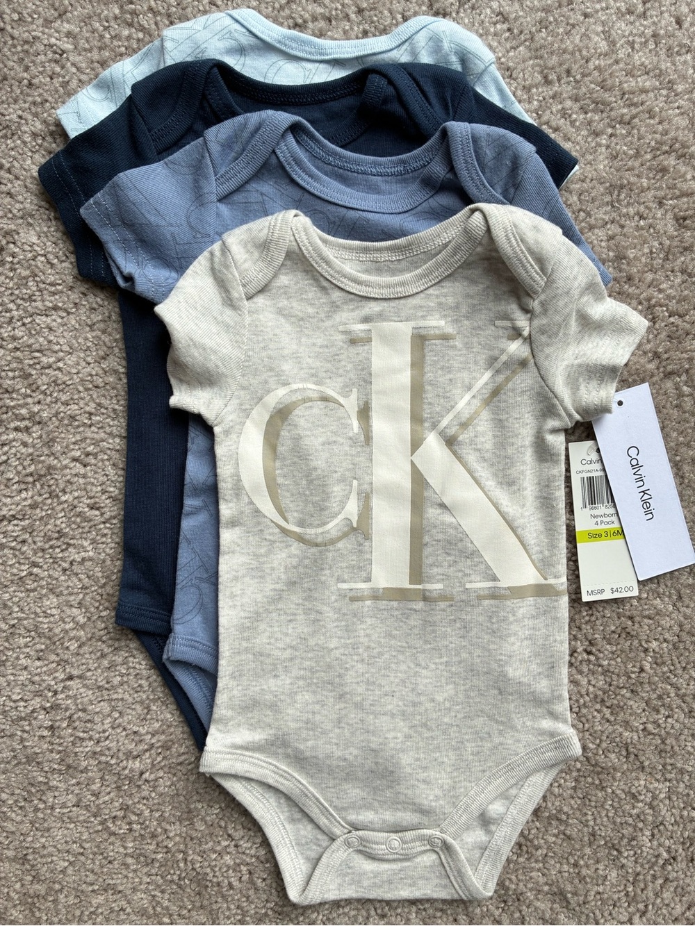 Calvin Klein 4-Pack One-Piece Bodysuits — Light Gray, Navy, Blue, Light Blue